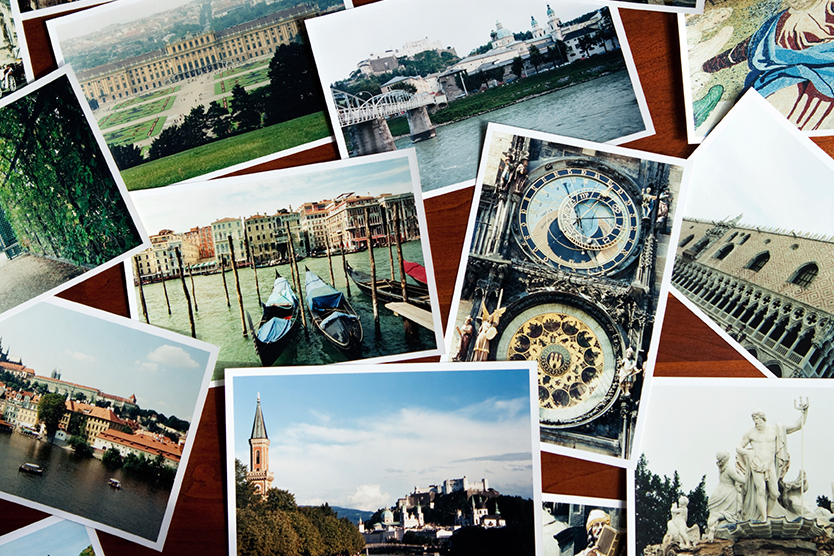 Ansichtskarten verschiedener Orte symbolisiert Tourismus in Europa; Quelle: iStockphoto.com/eurobanks