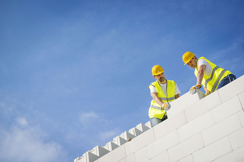 Construction workerssymbolizes Social Market Economy