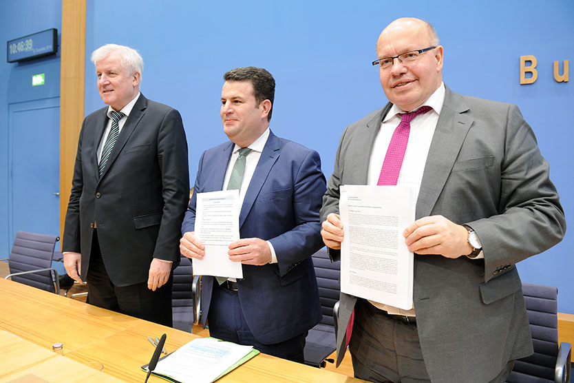 Federal Minister for Economic Affairs and Energy Peter Altmaier, Federal Labour Minister Hubertus Heil, Federal Minister of the Interior Horst Seehofer (LTR)