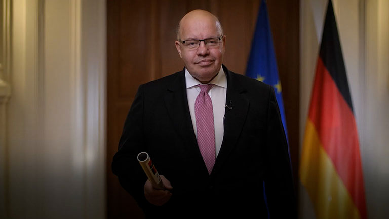 Federal minister Peter Altmaier hands over the baton to Portugal